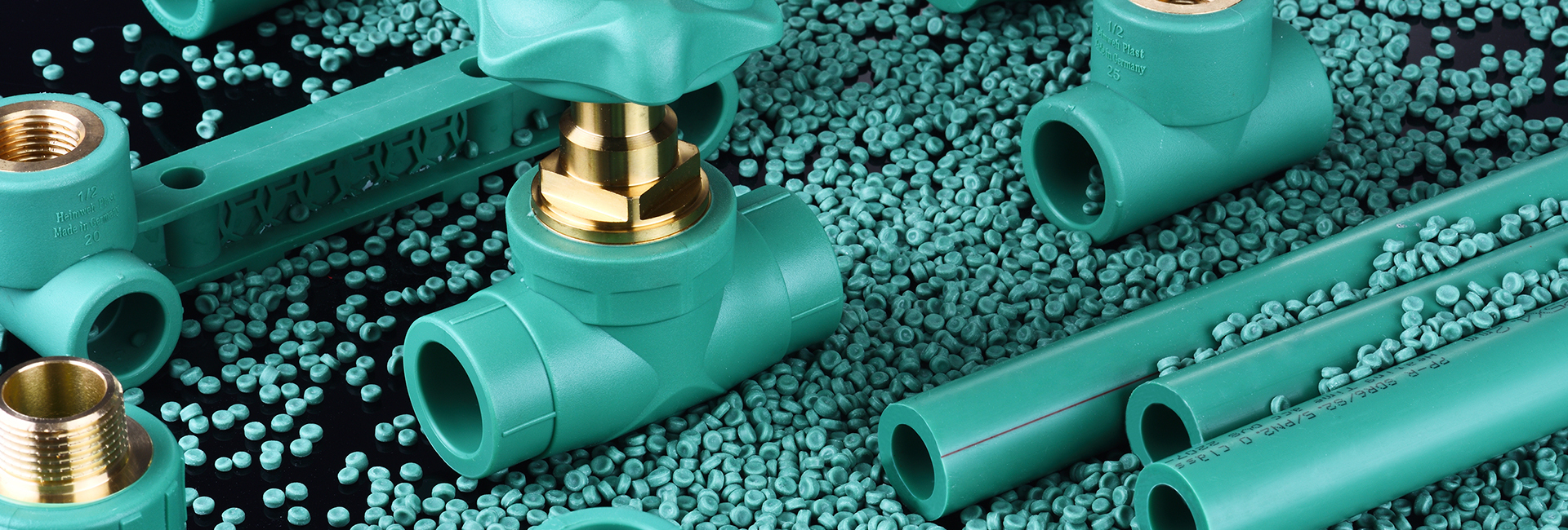 Green plastic pipes and fittings